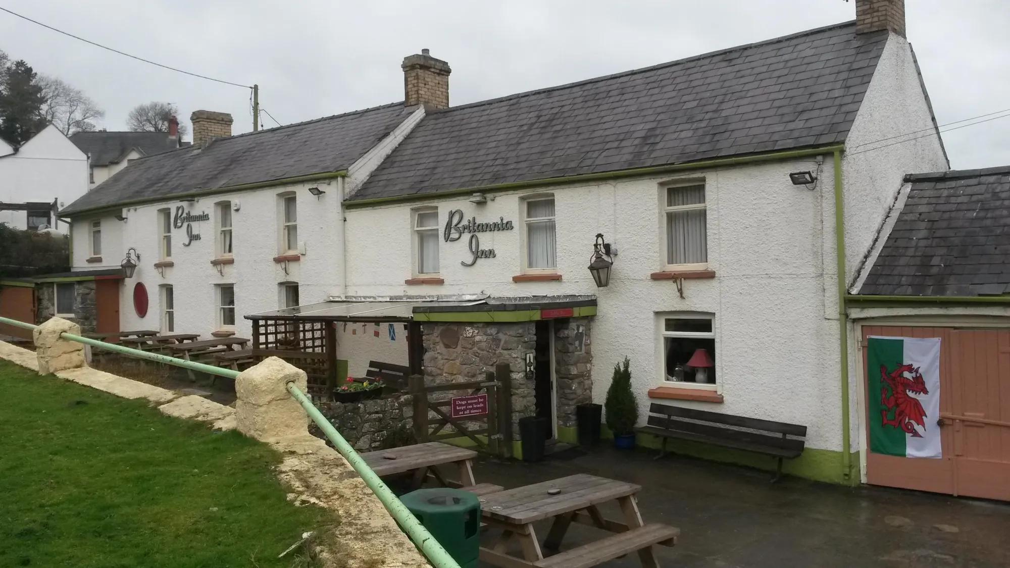 Llanmadoc village green with pub and shop nearby